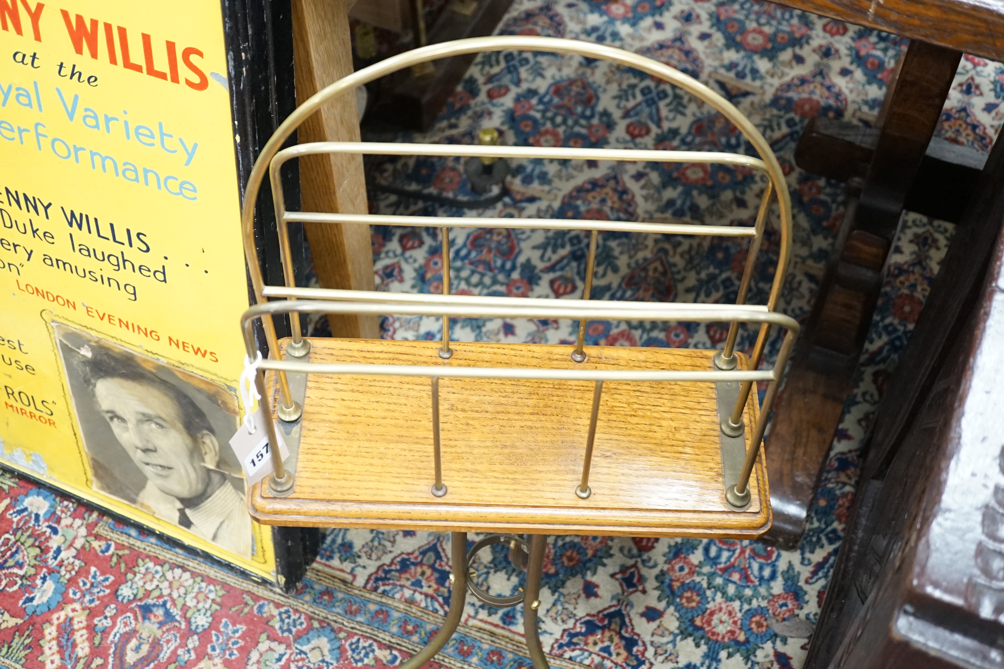 An Edwardian tubular brass and oak magazine rack, height 79cm